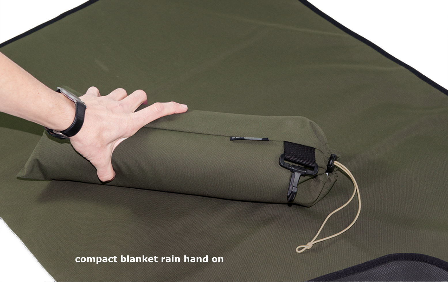 compact blanket rain hands on